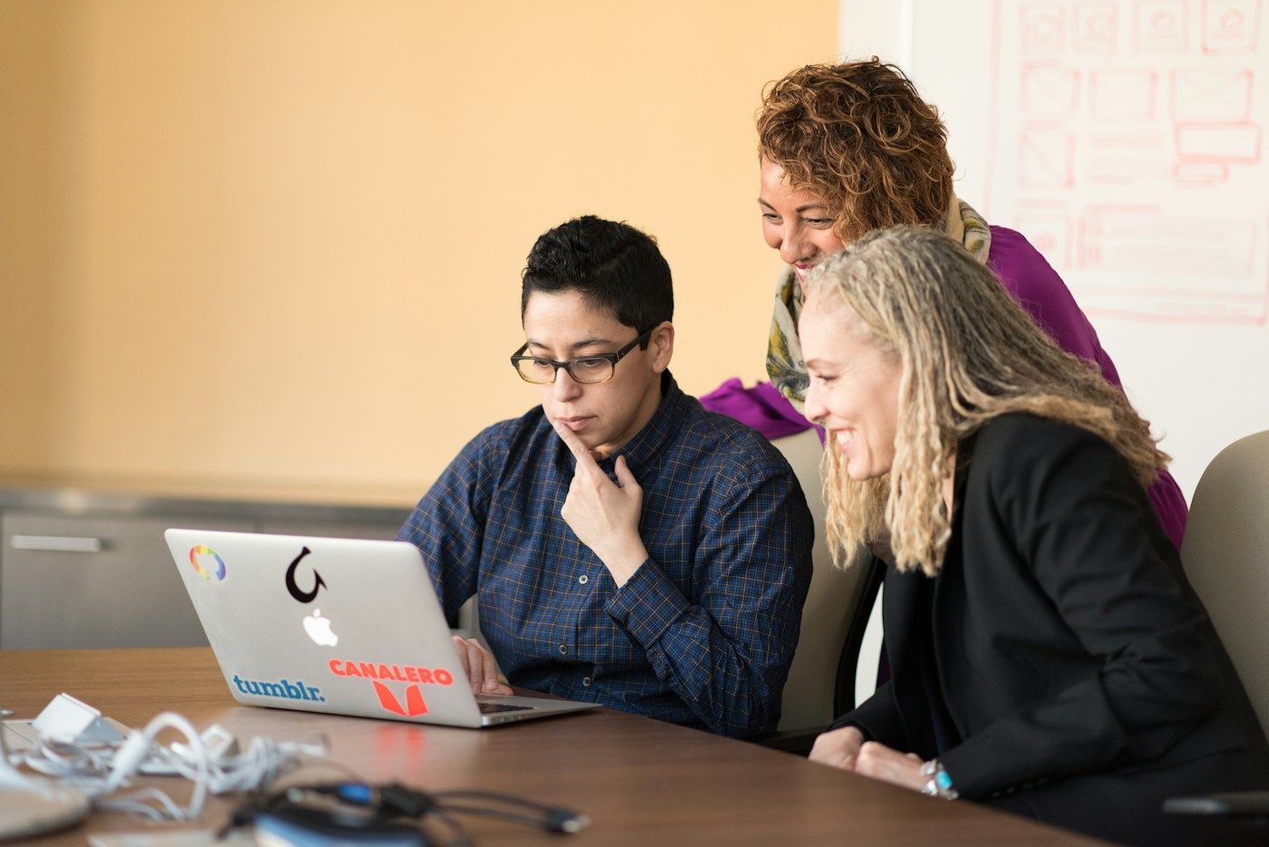 Advisers working through a decision